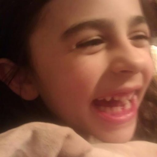Lost her first tooth!