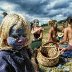 27534D1A00000578-3103895-Young_and_old_A_child_with_a_painted_face_sits_on_the_grass_amid-m-196_1433011205861