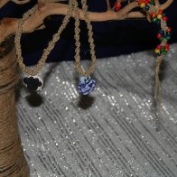 clay pendants i made on hemp and a beaded bracelet