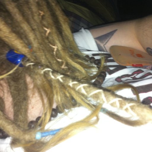 That will do sam that will do! One wrap in the back of my dreads not bad as I couldn't see.