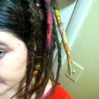 2ish months added a little roving wool to two dreads