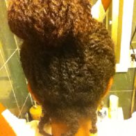 original natural loc at the center - she began eating up so much of the back of my hair.. thankfully i locked up the rest of my hair or I would have had a massive one growing back there