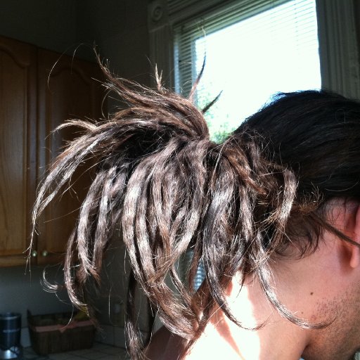 Hair tied up with the dreadies