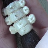 Handmade "vertebrae" bead from clay