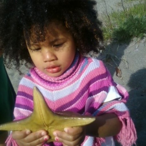 Kiah holding a starfish