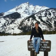 Tate sitting on sign in Grand Teton Mt ranage March 2009