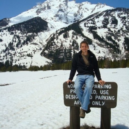 Tate sitting on sign in Grand Teton Mt ranage March 2009