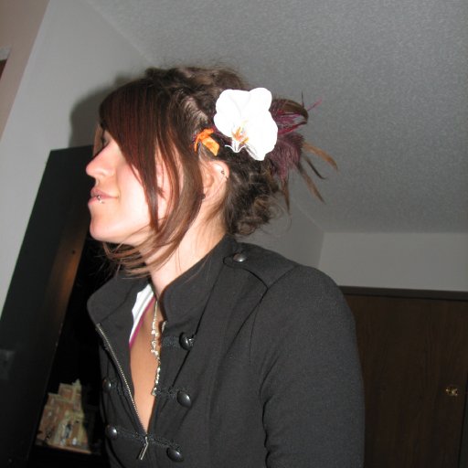 The typical updo with the hair flower.